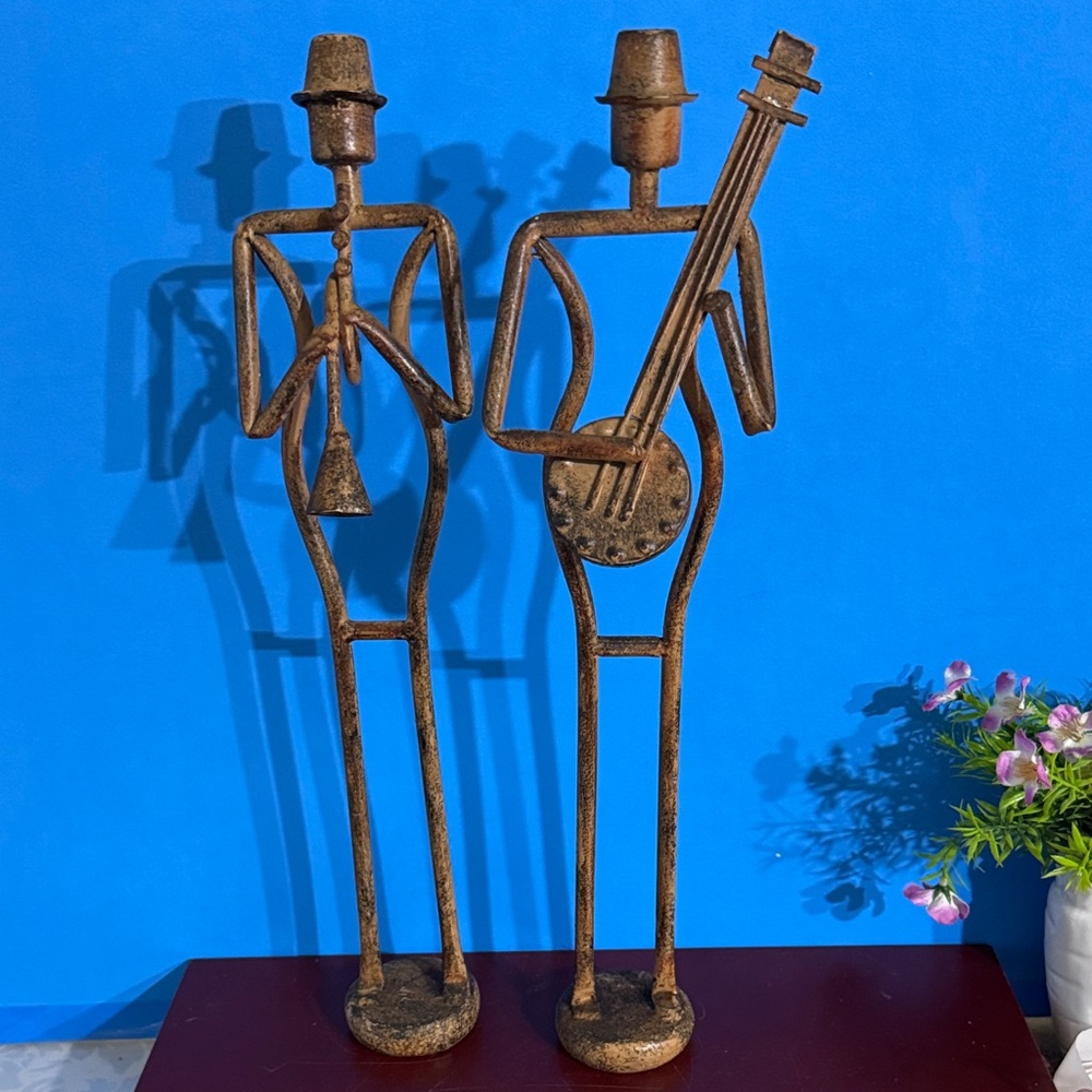 A pair of Vintage metal musician statues, depicting jazz band players